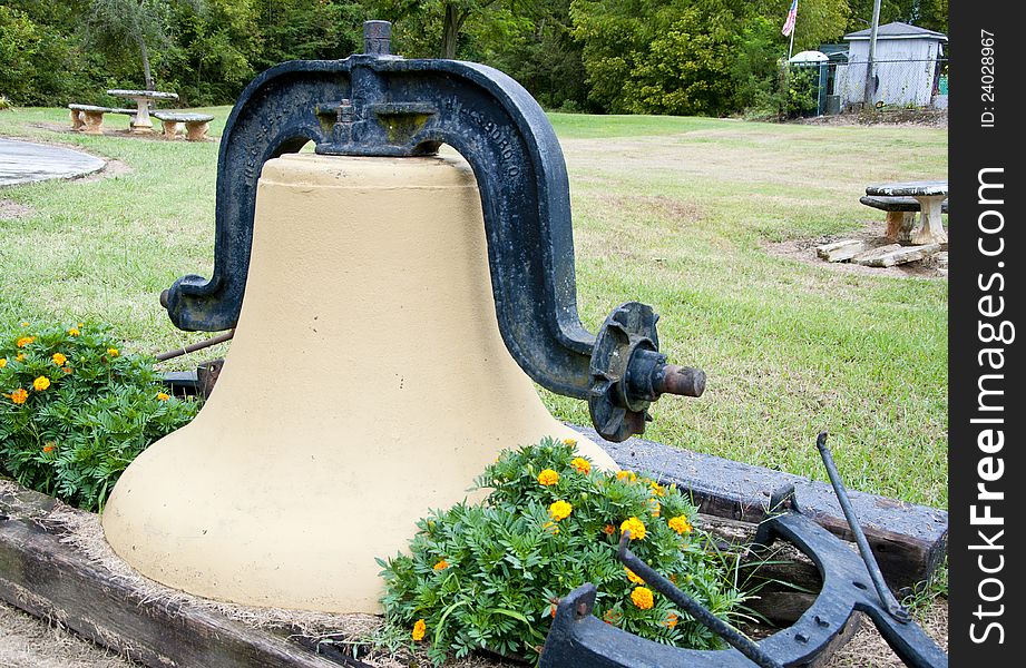 Old heavy liberty bell resting.