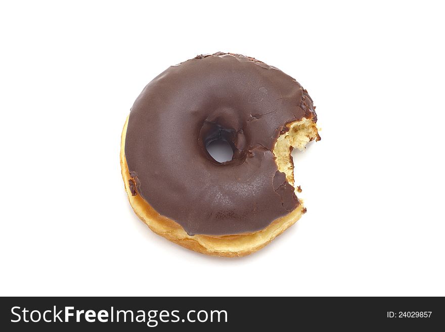 Single doughnut with chocolate icing, on white background