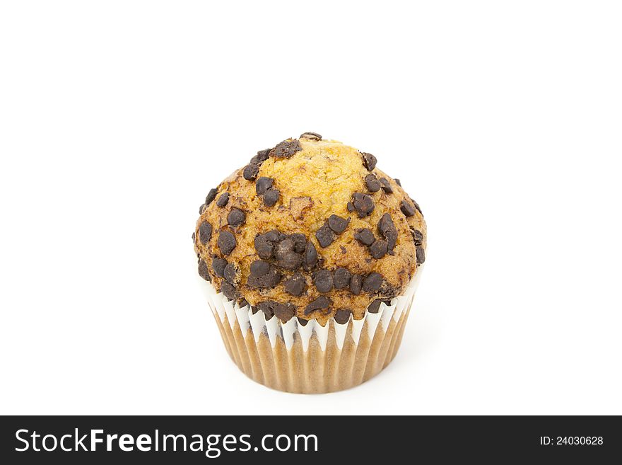 Delicious cupcake with chocolate flakes and white background. Delicious cupcake with chocolate flakes and white background