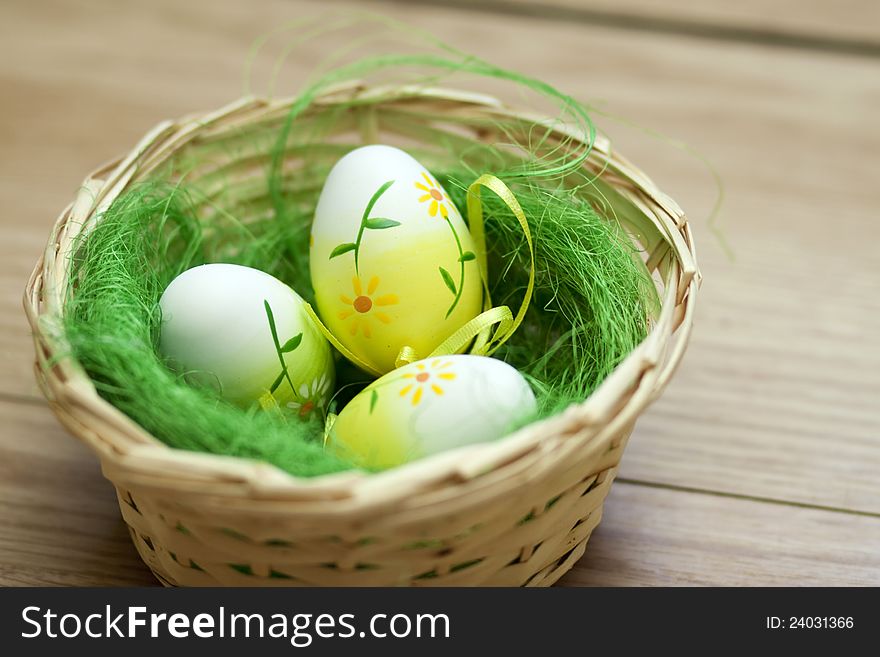 Vintage photo of a basket with easter eggs