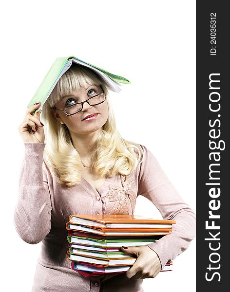 Girl holds a book on her head isolated