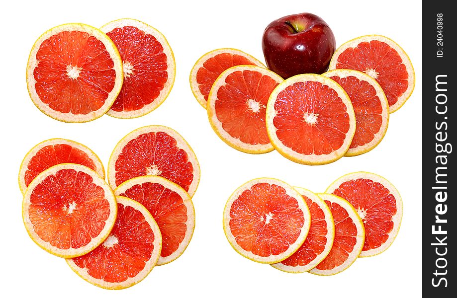 Attractive isolated grapefruits slices and apple. Citruses serial. Attractive isolated grapefruits slices and apple. Citruses serial