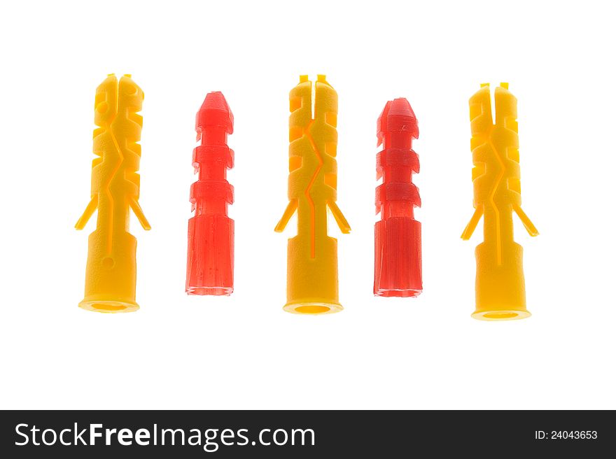 Five Colorful Plastic Dowels on White Background