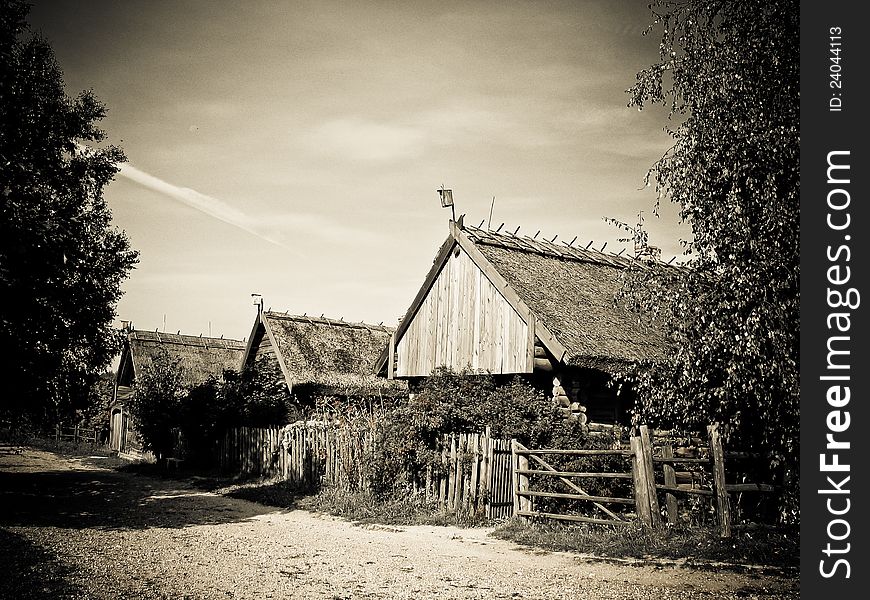 Retro house with a thatched roof, standing for a long time