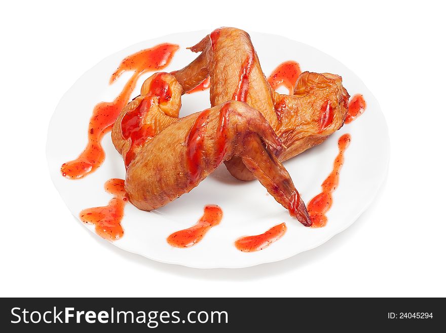 Smoked chicken wings on white background