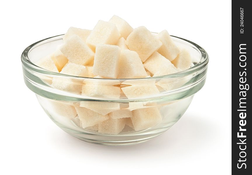 Cubic sugar pile in a bowl against white background