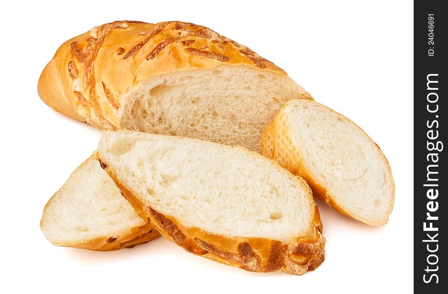 Cut white bread loaf against white background