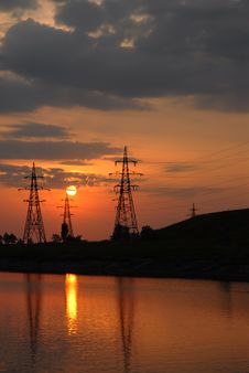 Sunset On The River. Electricity Power Line. Royalty Free Stock Image Sunset On The River. Electricity Power Line. Royalty Free Stock Image