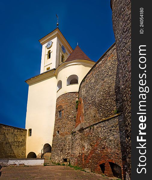 Ancient castle; blue sky; clock tower; historic landmark;  fortress; historic architecture;. Ancient castle; blue sky; clock tower; historic landmark;  fortress; historic architecture;