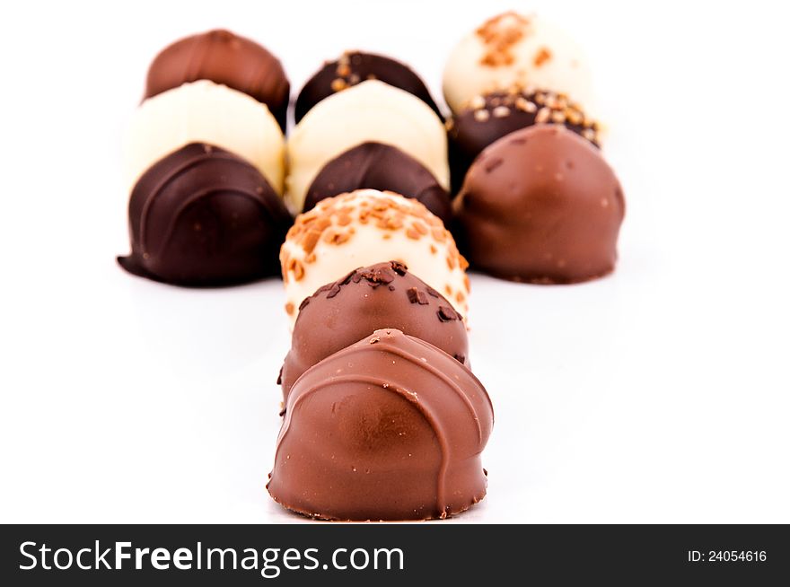 Chocolate pralines isolated on the white