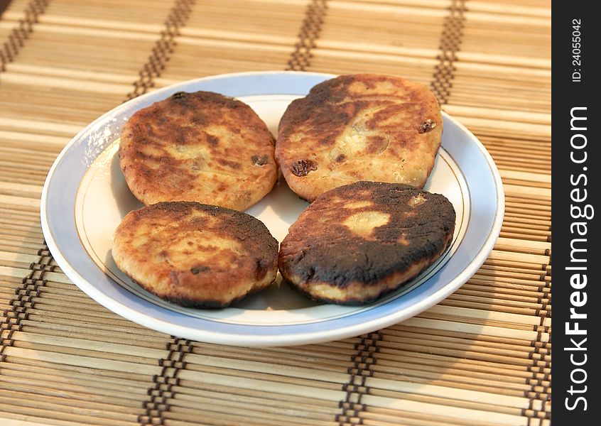 Cheese-and-curd cakes on a plate