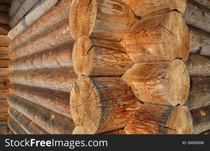 Wall of the rural house from wooden logs. Texture