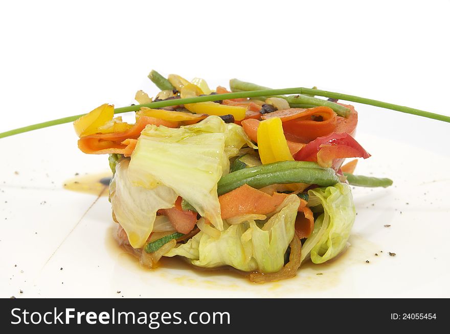 Vegetable salad onion ornaments on a white background