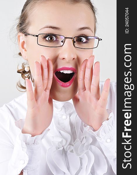 Business woman with glasses shouting