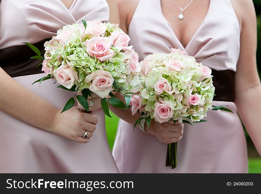 Bridal wedding bouquet of flowers in white, pink, and green