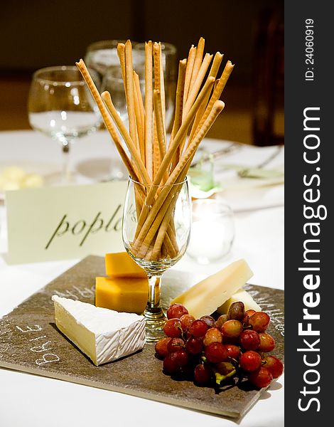 Cheese and bread sticks set out during a catered event