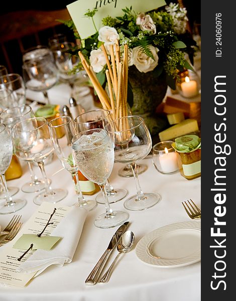 Wedding tables set for fine dining or another catered event. Wedding tables set for fine dining or another catered event