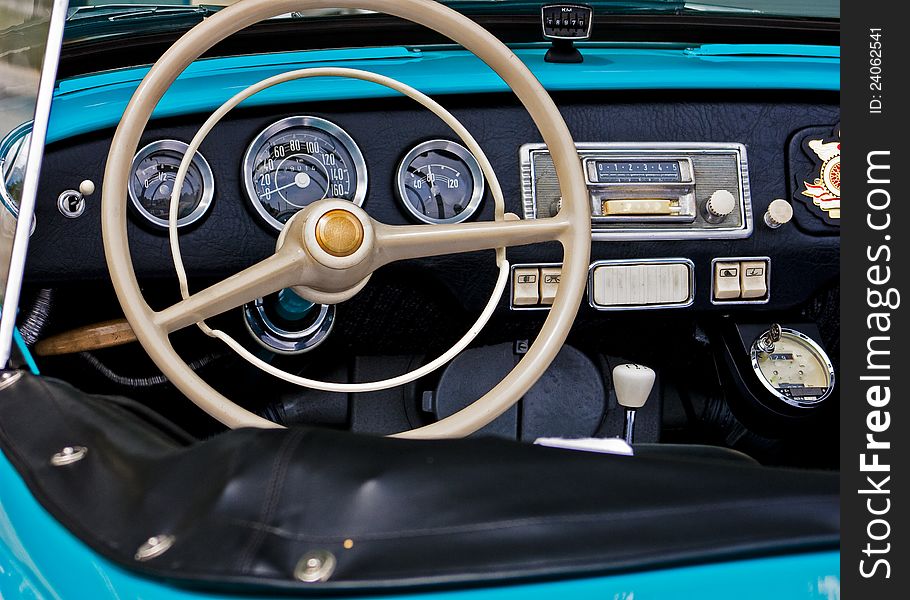 Interior of an blue classic retro car