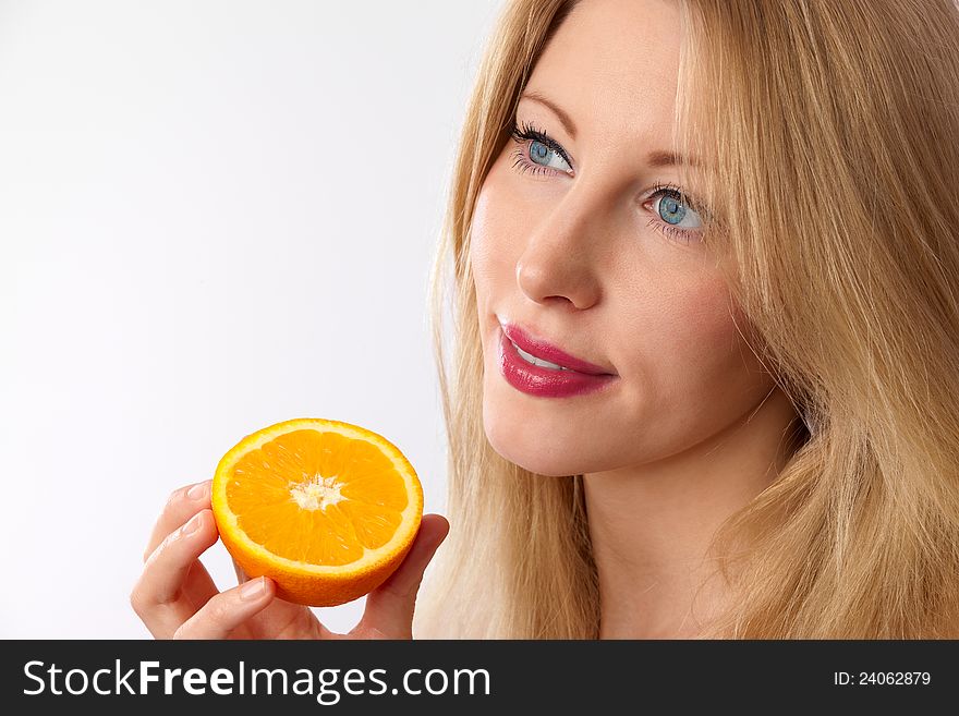 Caucasian Woman Holding Orange