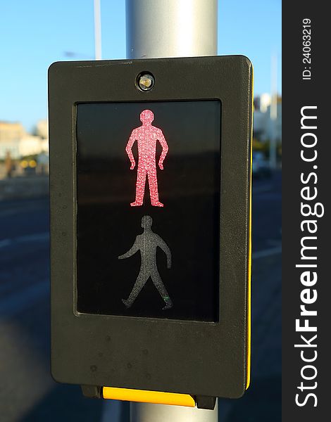 A pedestrian notification sign telling the person not to walk. A pedestrian notification sign telling the person not to walk