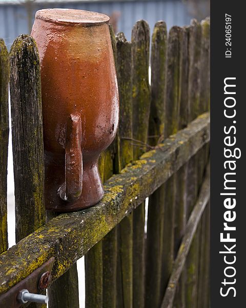 Old Pottery in fence in winter time.