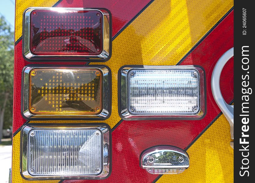 Tail lights of a firetruck on a sunny day. Tail lights of a firetruck on a sunny day