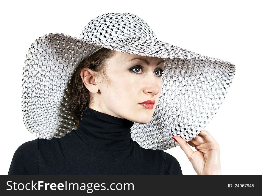 Beautiful girl in the hat isolated