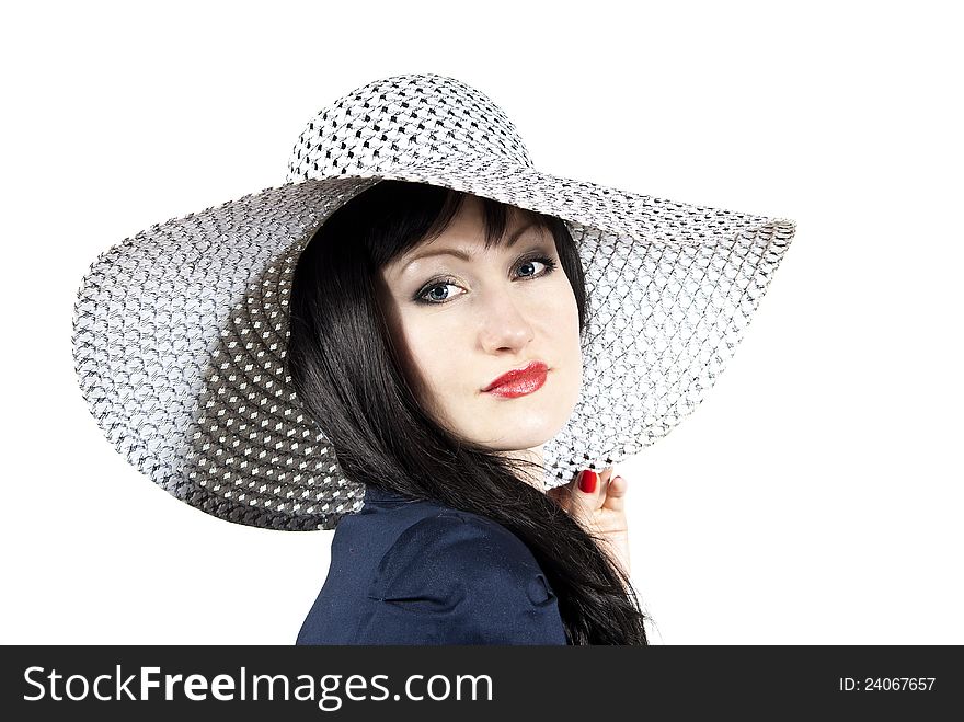 Portrait of a beautiful girl in the hat