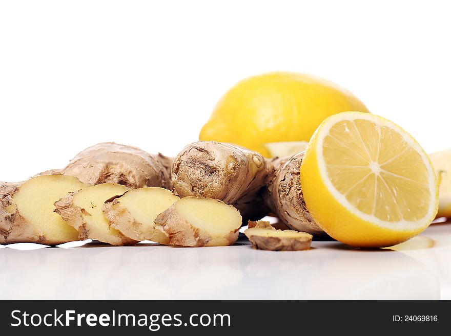 Fresh ginger root and lemon