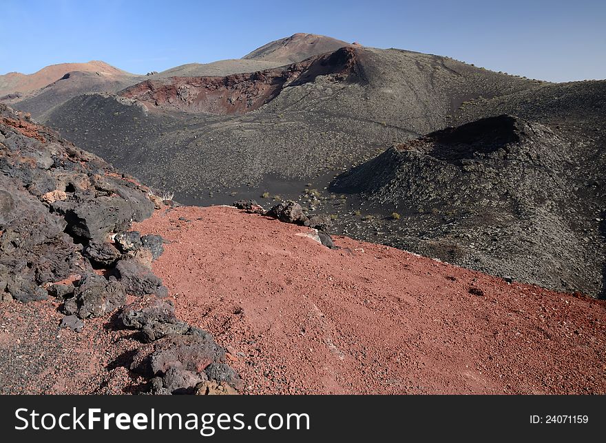 Old craters and multicolor ground after volcanic eruption. Old craters and multicolor ground after volcanic eruption