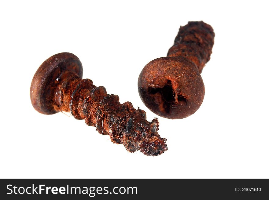Old rusted screws isolated on white background