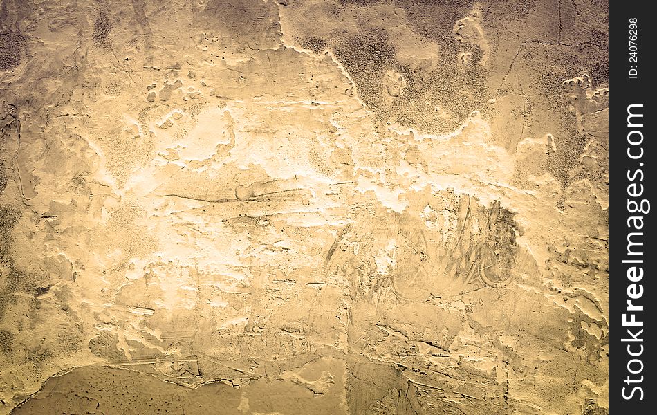 Toned vintage background of closeup fragment of grunge weathered stone wall. Toned vintage background of closeup fragment of grunge weathered stone wall