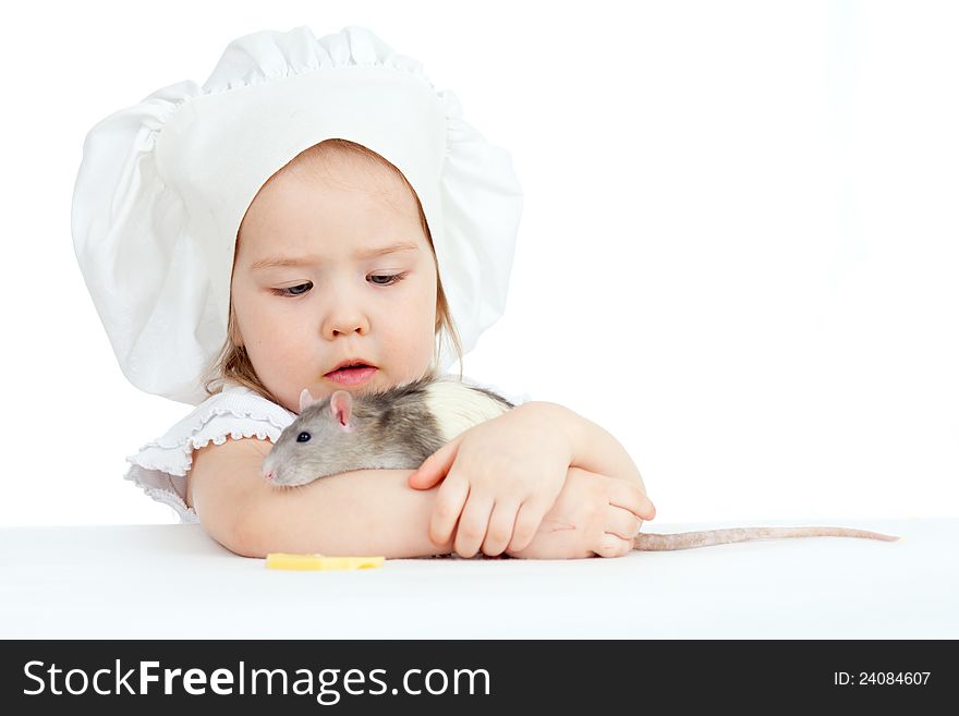 Little girl embracing domestic rat on white background