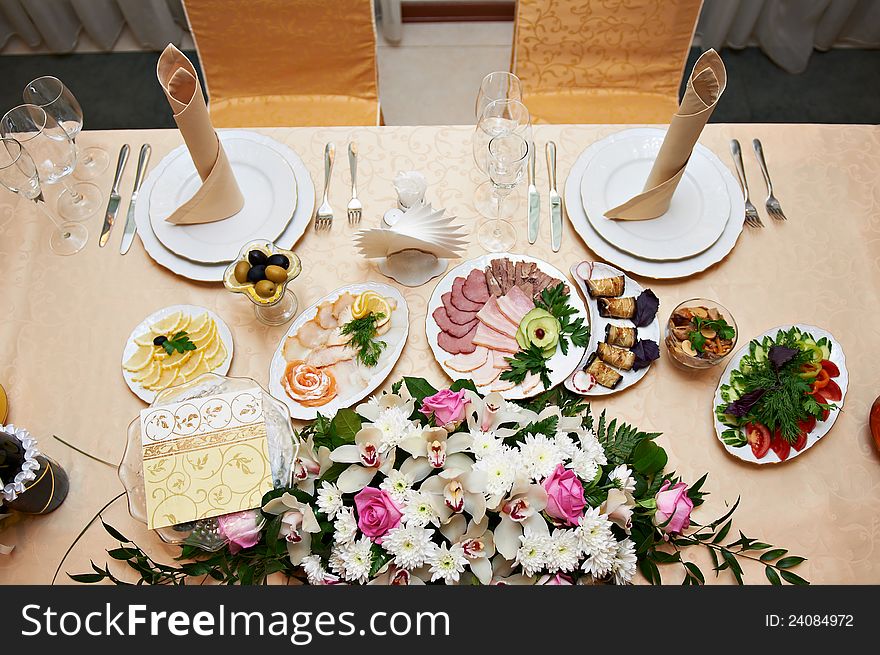 Wedding table for the bride and groom in restaurant. Wedding table for the bride and groom in restaurant