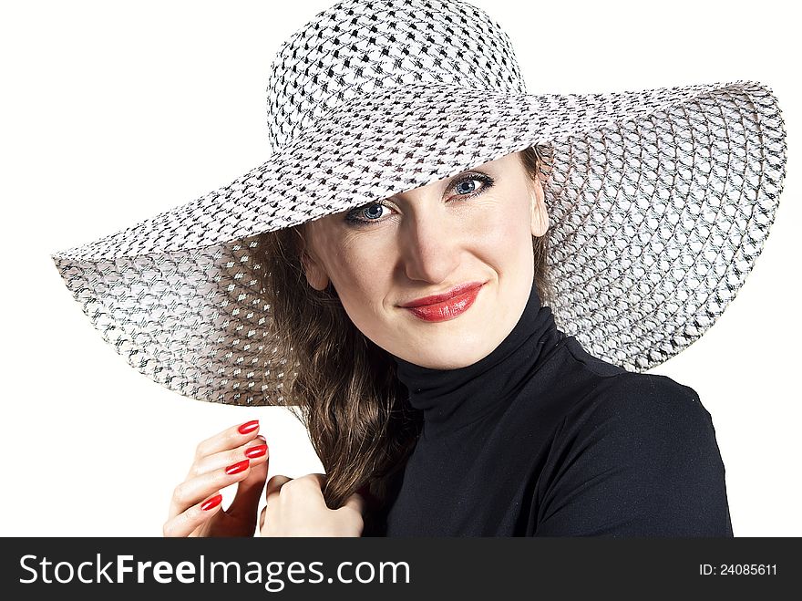 Girl in a hat isolated on white background