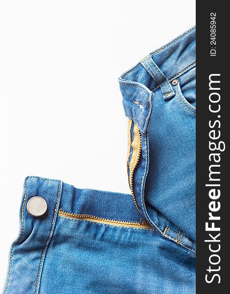 Frontside of a jeans with zipper on white background. Frontside of a jeans with zipper on white background