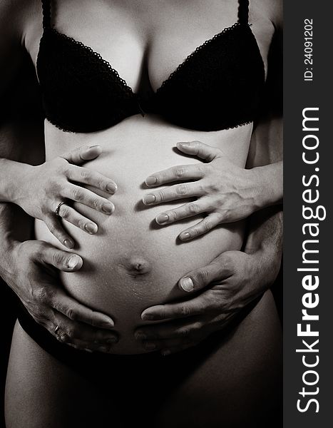 Hands On Pregnant Woman S
