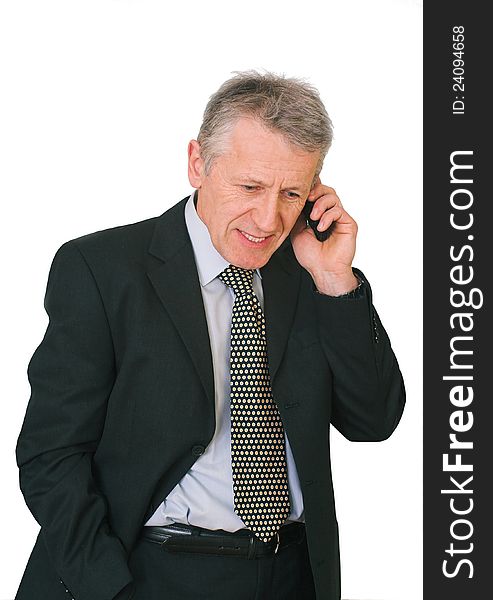 Businessman, manager - white, gray, well dressed men - makes a call on his cell phone. Businessman, manager - white, gray, well dressed men - makes a call on his cell phone.
