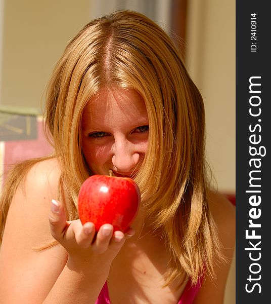 Young girl with the red apple. Young girl with the red apple