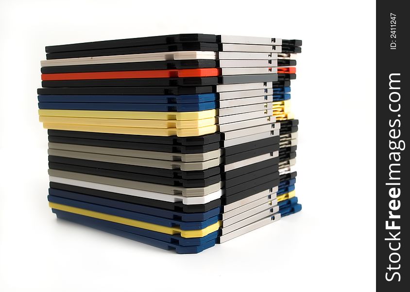 Close up of stack of floppy discs on white background