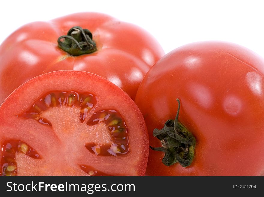 Fresh tomatoes over white background. Fresh tomatoes over white background