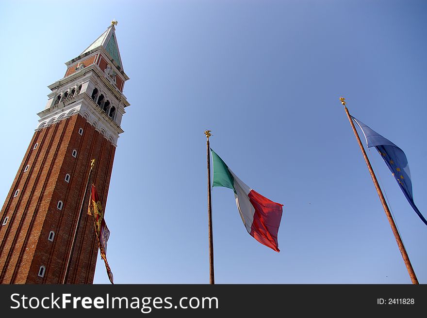 Venice tower and flags