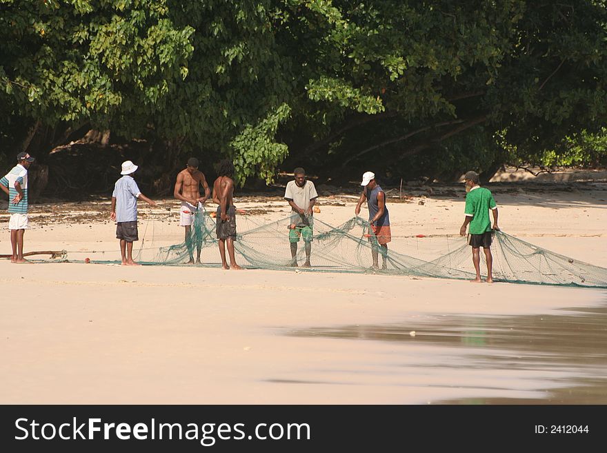 Fishermen And Fishing Net .