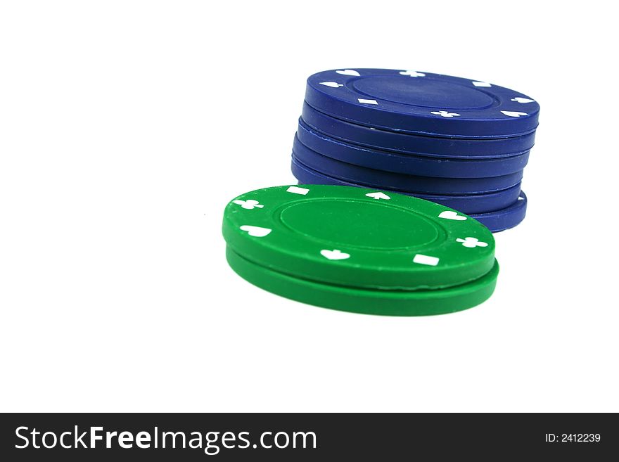 Stacks of poker chips isolated overwhite