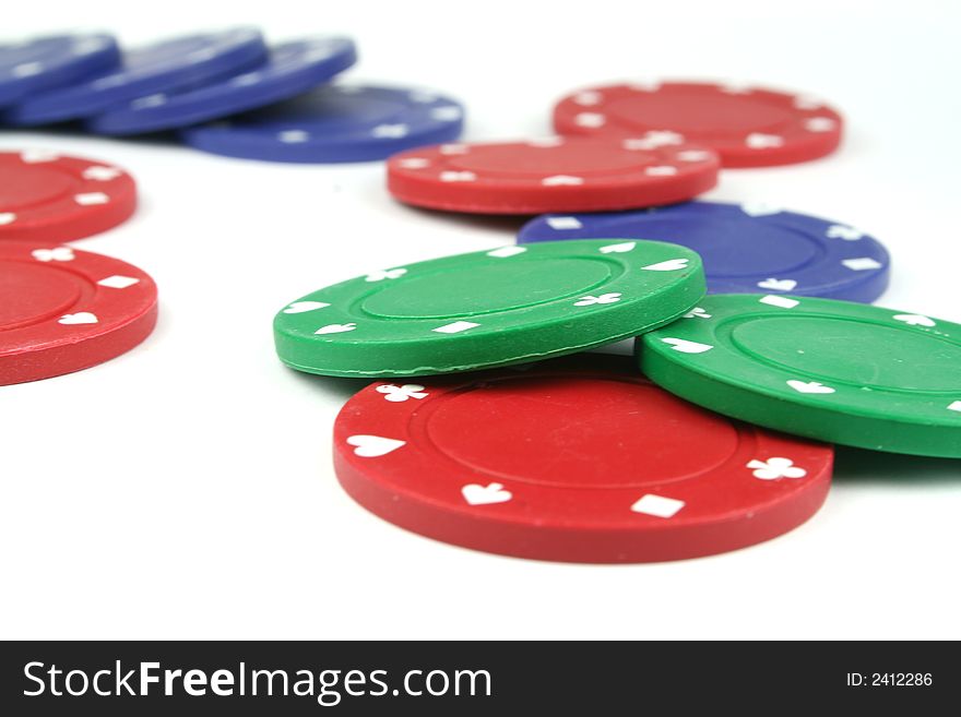 Stacks of poker chips isolated overwhite