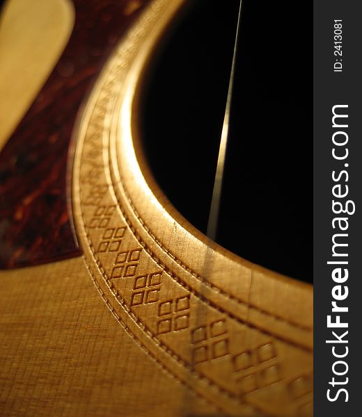 Spanish style acoustic guitar string close up. Spanish style acoustic guitar string close up.