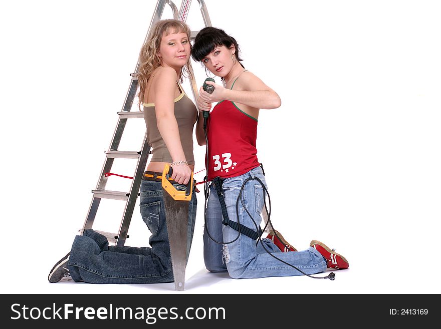 Two women with a tools  on white background. Two women with a tools  on white background