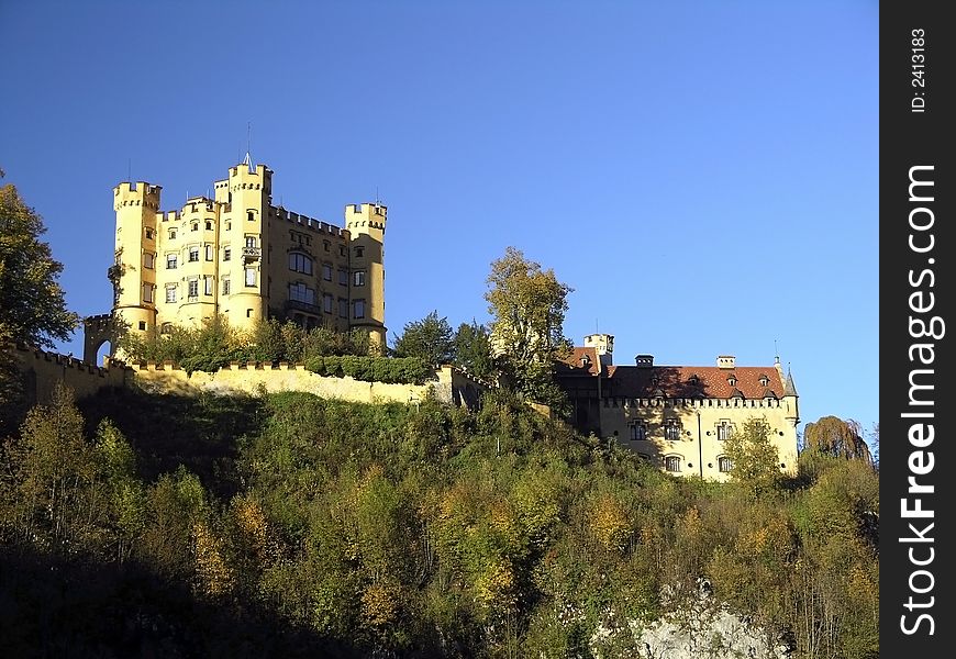 Royal castle Hohenschwangau, Bavaria, Germany. Blue sky in background.