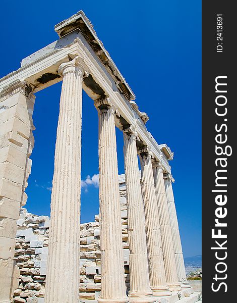 The Erechtheion, Athens - with ionic column tops, perfect blue sky. The Erechtheion, Athens - with ionic column tops, perfect blue sky