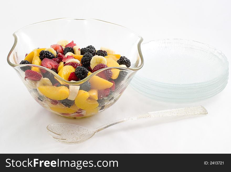 A beautiful clear glass bowl makes a wonderful home for sliced peaches, chunks of strawberries, slices of bananas and whole blackberries. A beautiful clear glass bowl makes a wonderful home for sliced peaches, chunks of strawberries, slices of bananas and whole blackberries.
